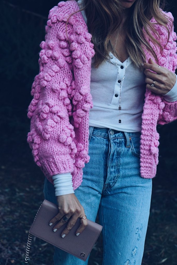 pink chunky sweater