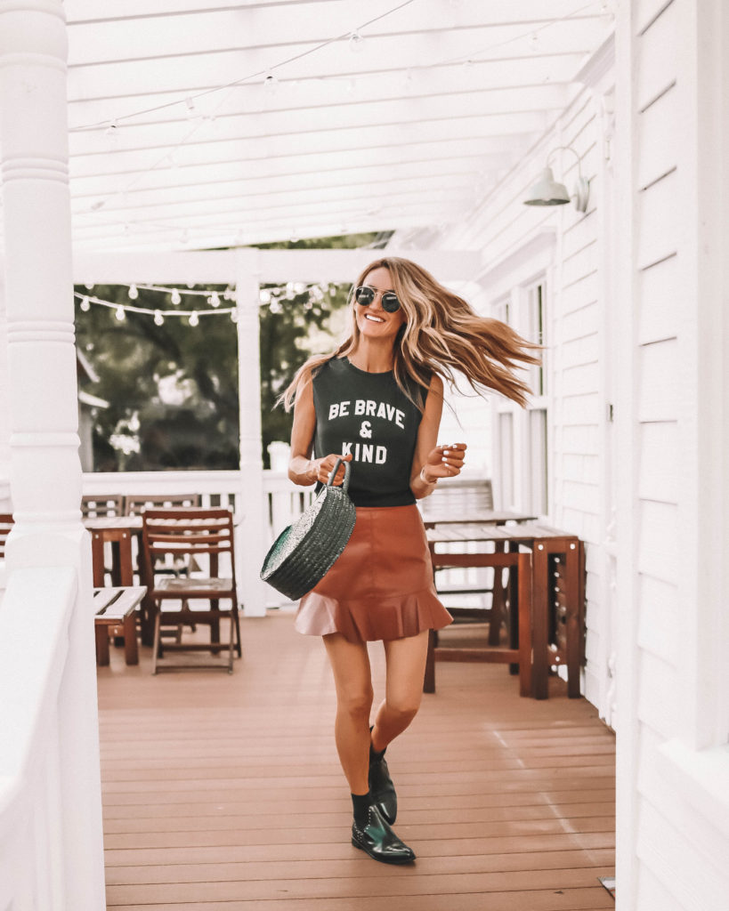 Cognac mni skirt, black tee, black booties, fall essentials | Fall Essentials featured by popular Indianapolis fashion blogger, Karina Style Diaries
