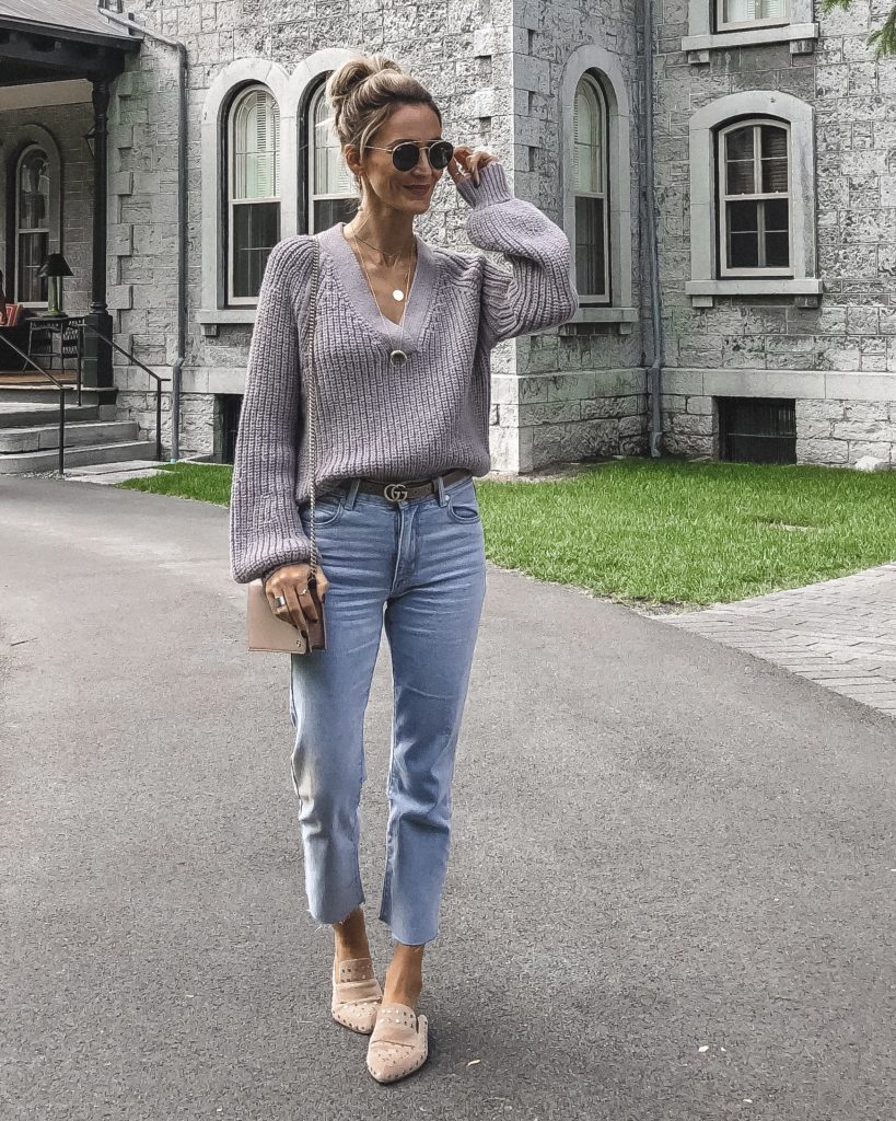 Lavender chunky sweater, cropped denim, studded flats | The Ultimate Short Trip Packing List featured by top Indianapolis travel blogger, Karina Style Diaries