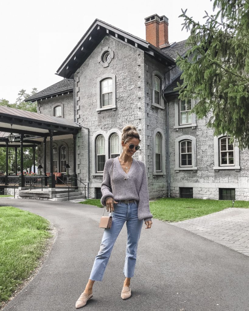 Lavender chunky sweater, cropped denim, studded flats | The Ultimate Short Trip Packing List featured by top Indianapolis travel blogger, Karina Style Diaries