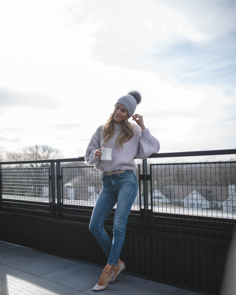Chicwish cute winter looks featured by top Indianapolis fashion blog, Karina Style Diaries: image of a woman wearing a Chicwish lavender cropped sweater, Evereve cropped jeans, Jimmy Choo glitter pumps, a pom pom beanie hat and a Gucci belt