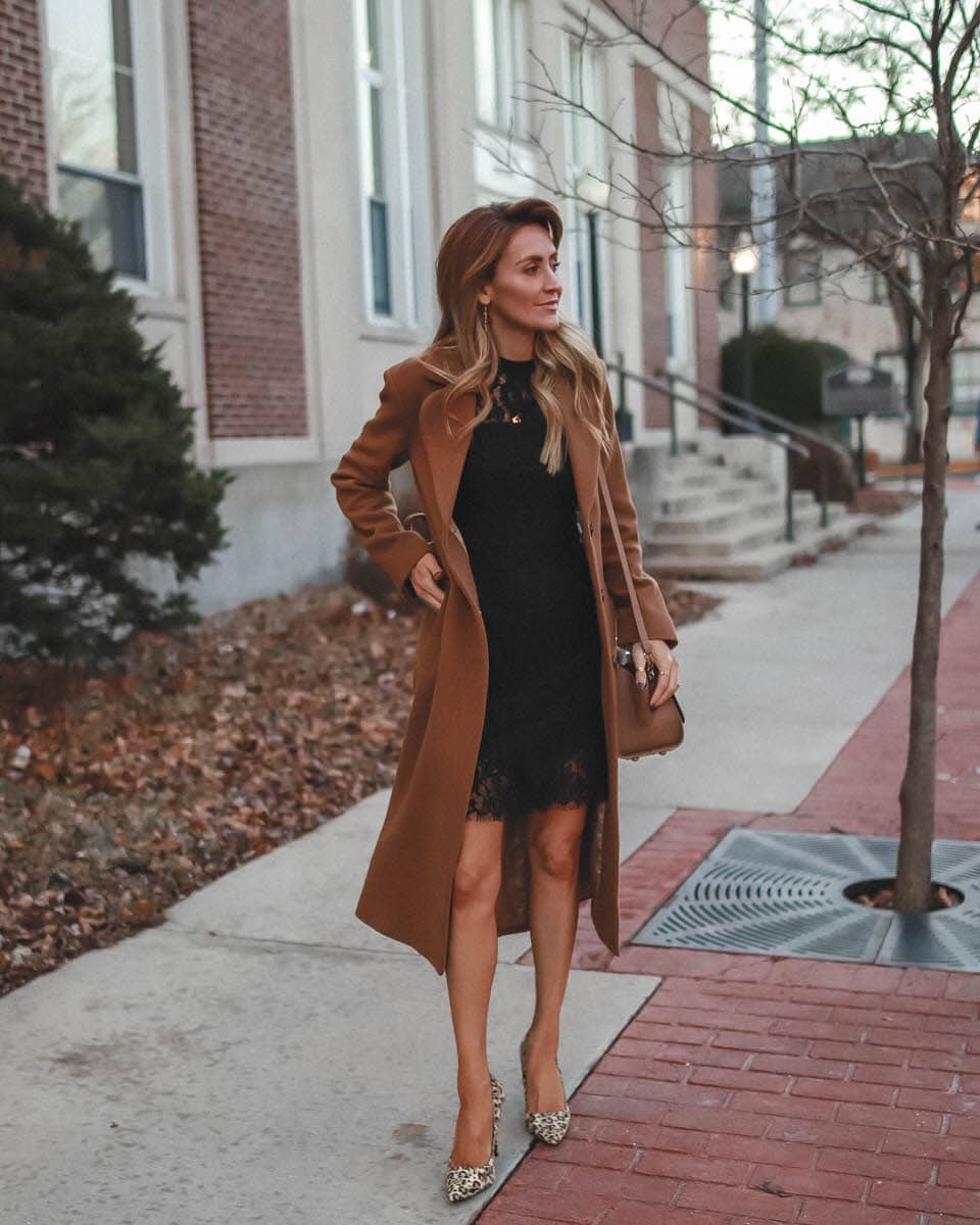 3 Cute Holiday Party dresses under $50 featured by top Indianapolis fashion blog, Karina Style Diaries: image of a woman wearing a Pink Lilly black lace dress, & Other Stories A Line Wool blended coat, Sam Edelman leopard heels and a Zac Zac Posen cross body bag