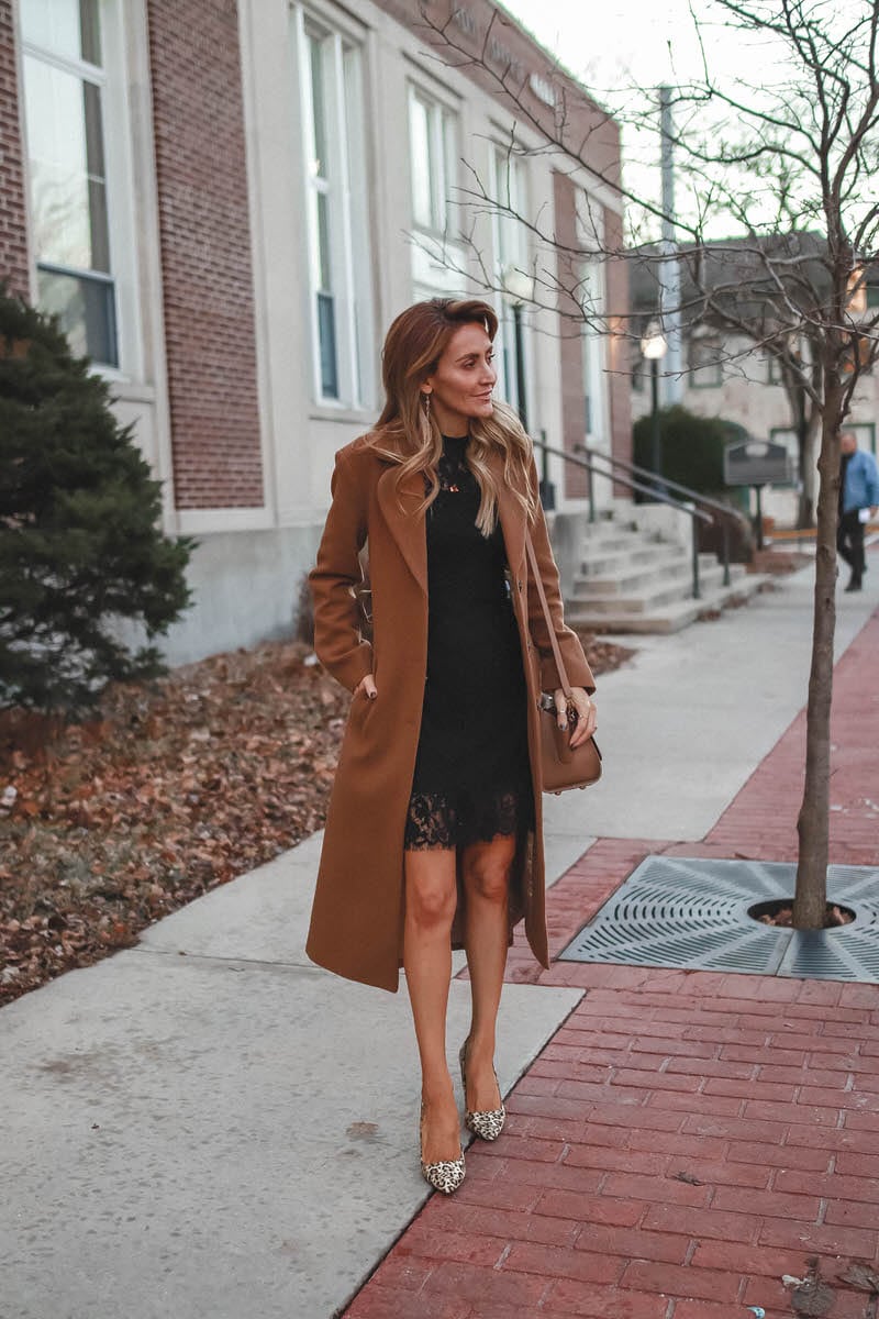 3 Cute Holiday Party dresses under $50 featured by top Indianapolis fashion blog, Karina Style Diaries: image of a woman wearing a Pink Lilly black lace dress, & Other Stories A Line Wool blended coat, Sam Edelman leopard heels and a Zac Zac Posen cross body bag
