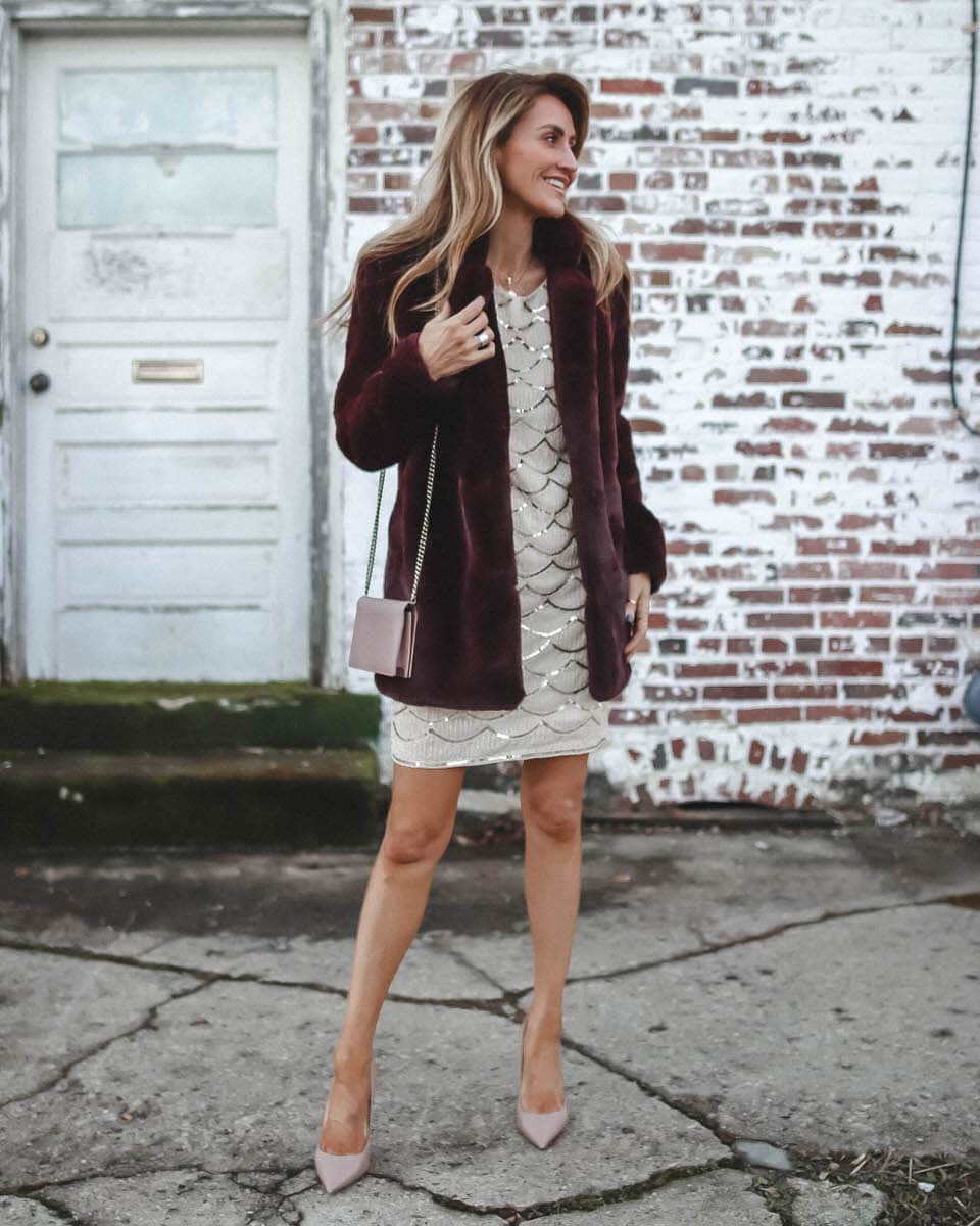 3 Cute Holiday Party dresses under $50 featured by top Indianapolis fashion blog, Karina Style Diaries: image of a woman wearing a Pink Lilly sequin dress, ASTR faux fur coat, Steve Madden suede heel pumps and a Gucci petite marmot