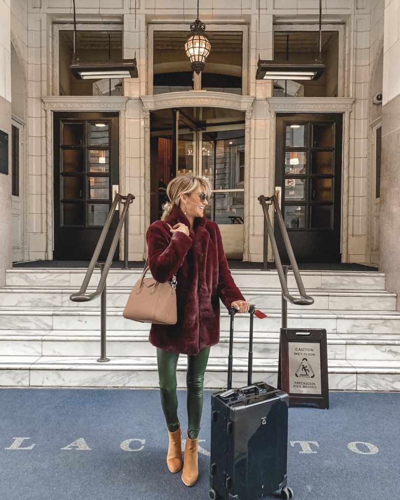 The Blackstomne Hotel Chicago | ASTR the label fur coat | green faux leather leggings Weekly outfit recap featured by top US fashion blogger, Karina Style Diaries: image of a woman wearing an ASTR faux fur coat, faux leather leggings, fuzzy sweater, Free People booties and Givenchy satchel