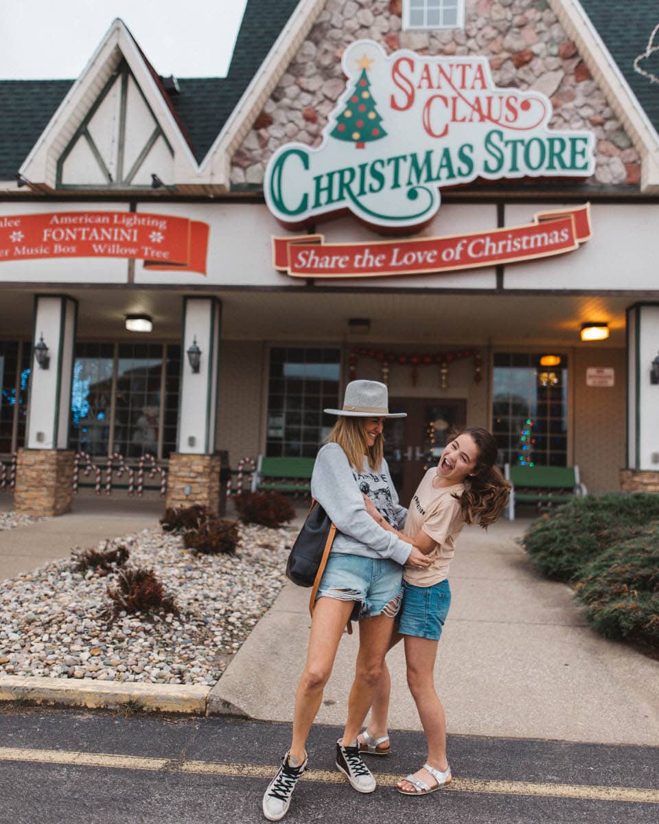 Christmas Store in Santa Claus Indiana, mom and daughter hugging