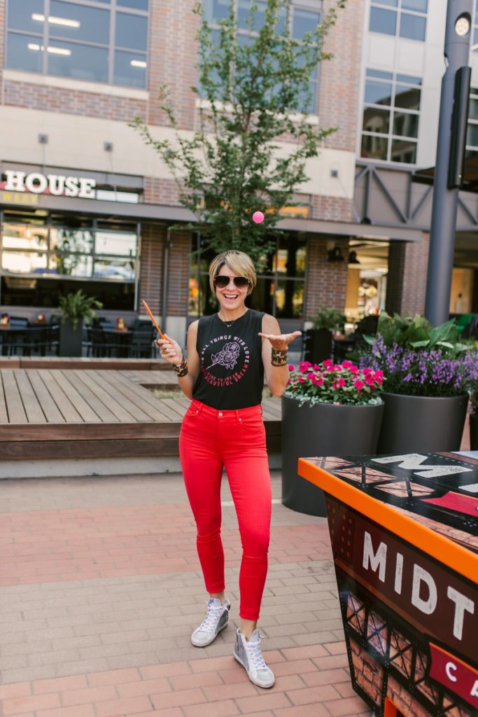 Beth Chappo from Seersucker and Saddles wears Evereve | red jeans muscle tee 