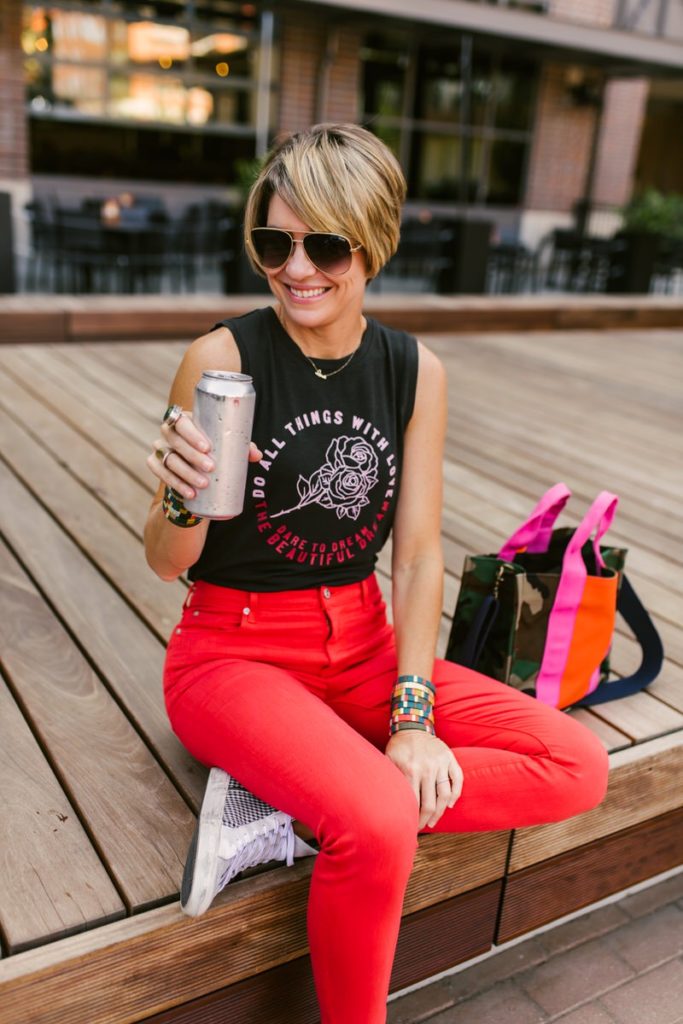 Beth Chappo from Seersucker and Saddles wears Evereve | red jeans muscle tee 