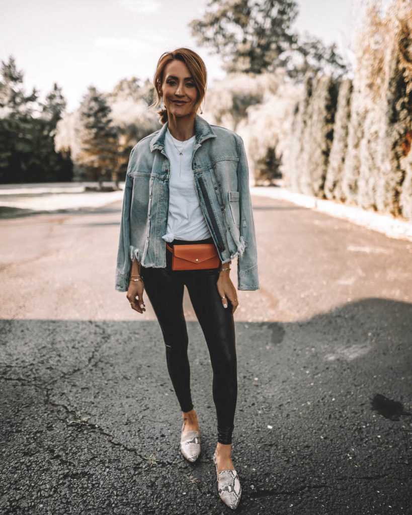 Karina Style Diaries wearing spanx faux leather leggings white tee jeans jacket belt bag snakeskin loafers