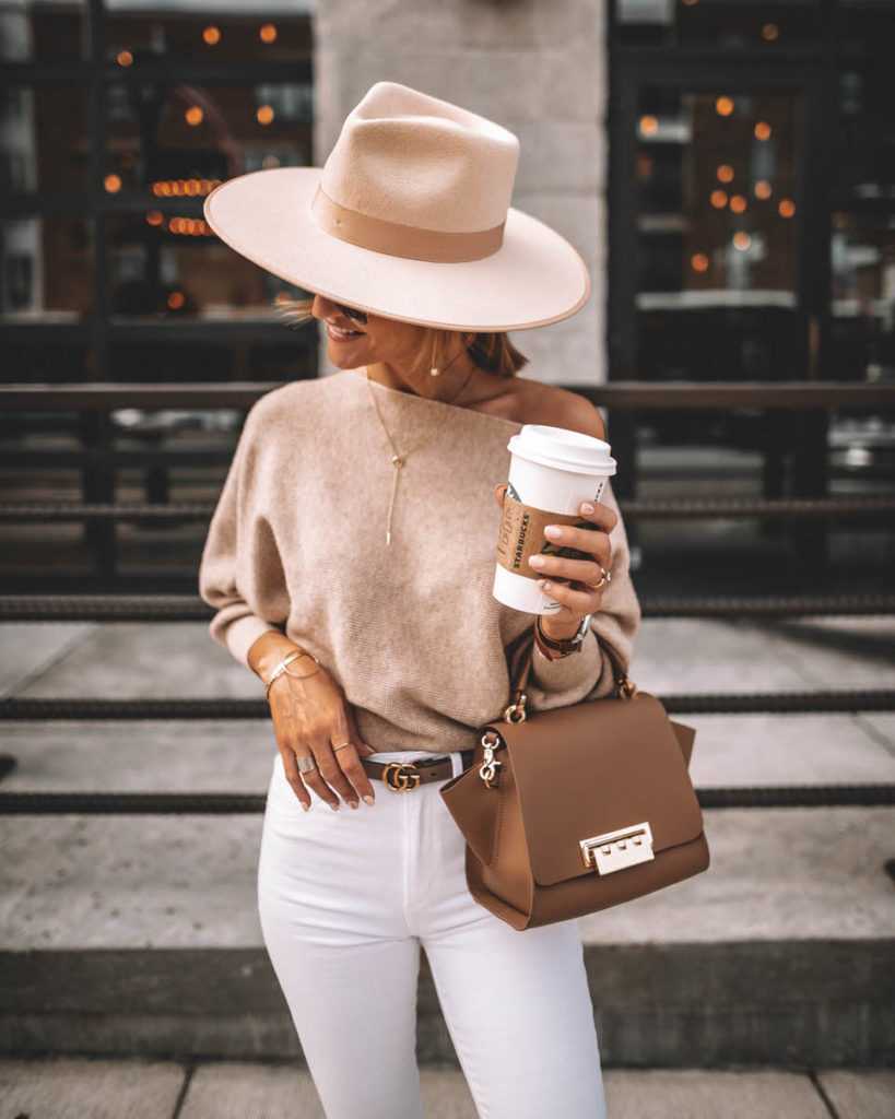 Karina Style Diaries wearing white skinny jeans chic outfit idea lack of color rancher hat suqre sunglasses zac posen eartha bag off the shoulder sweater gucci princetown bumble bee loafers