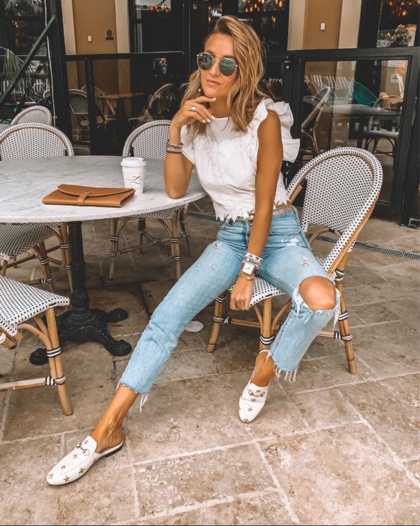 Karina Style Diaries wearing white ruffle top levis 501's and gucci loafers