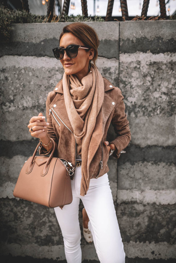 Karina Style Diaries wearing white jeans chic outfit suede moto jacket cashmere scarf gucci princetown bumblebee loafer givenchy antigona gucci belt