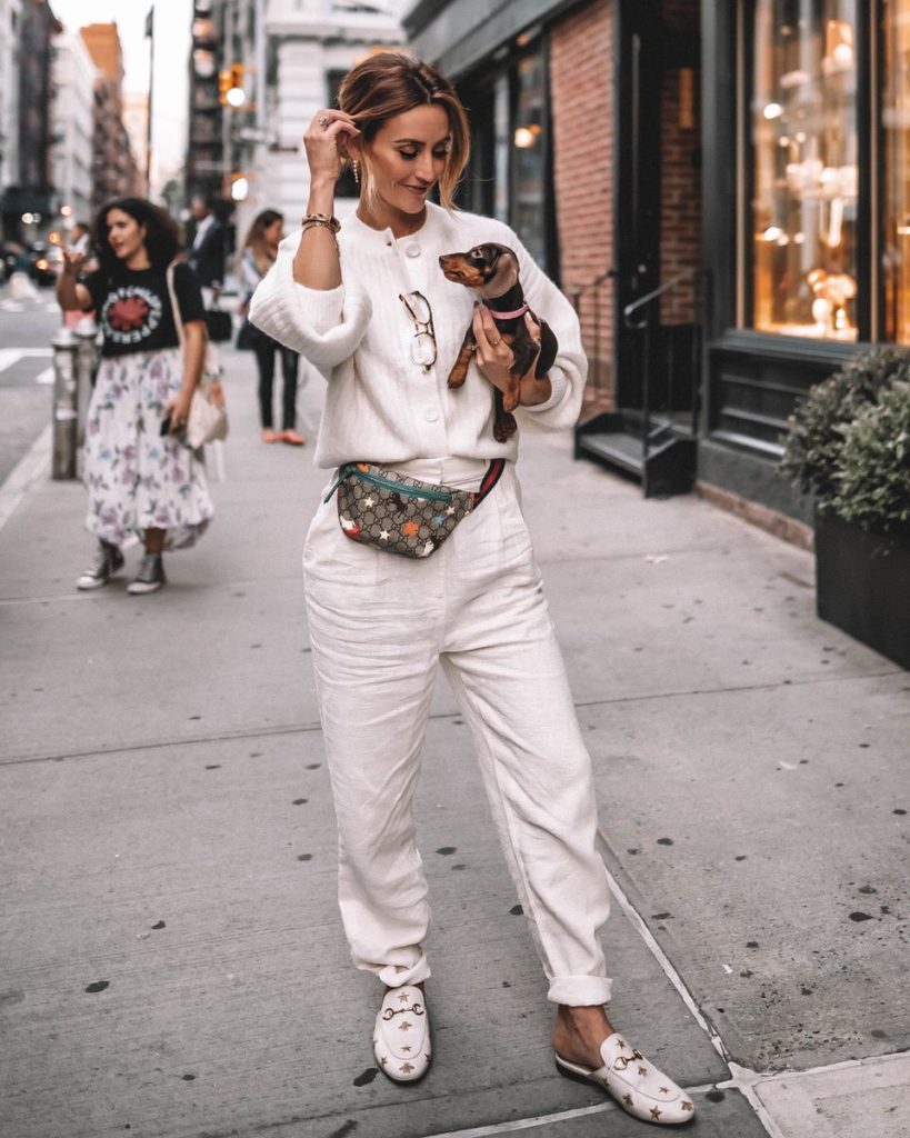 Karina Style Diaries wearing cream monochromatic outfit high waist linen pants oversized sweater and tee gucci belt bag gucci princetown bumble bee loafers 