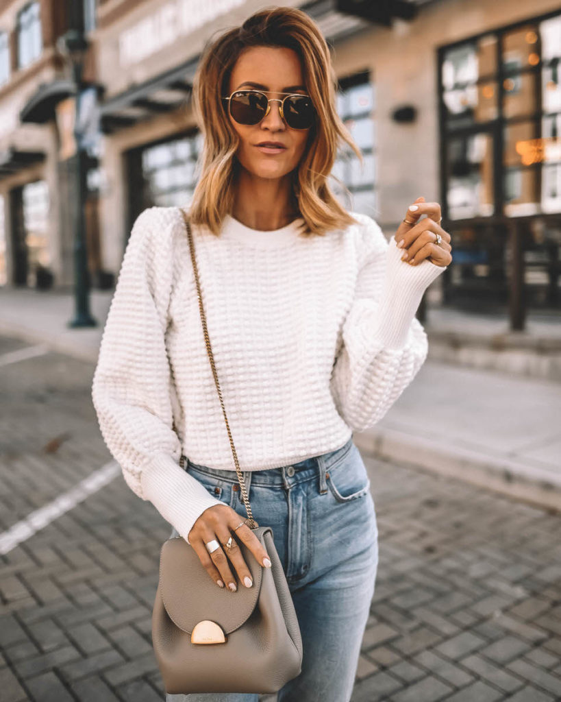Fall style white textured sweater mom jeans chain bag