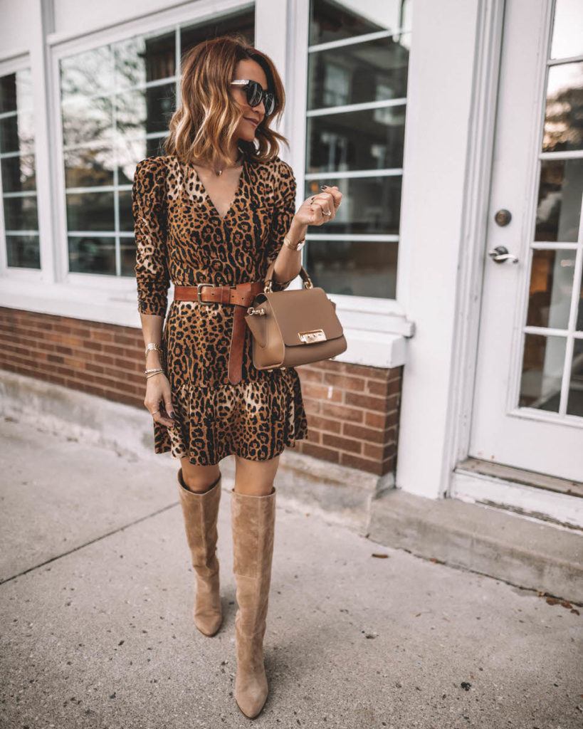 Karina Style Diaries wearing leopard print mini dress belted tall suede boots Zac Posen top handle Eartha handbag