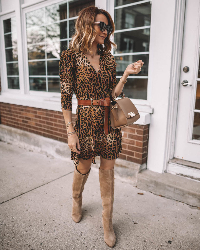 Karina Style Diaries wearing leopard print mini dress belted tall suede boots Zac Posen top handle Eartha handbag