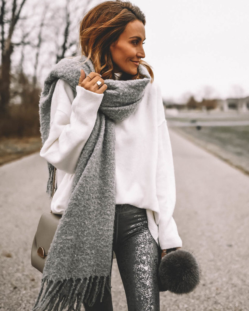 Karina Style Diaries wearing foil silver leggings oversized white sweater blanket scarf pompom beanie cozy outfit