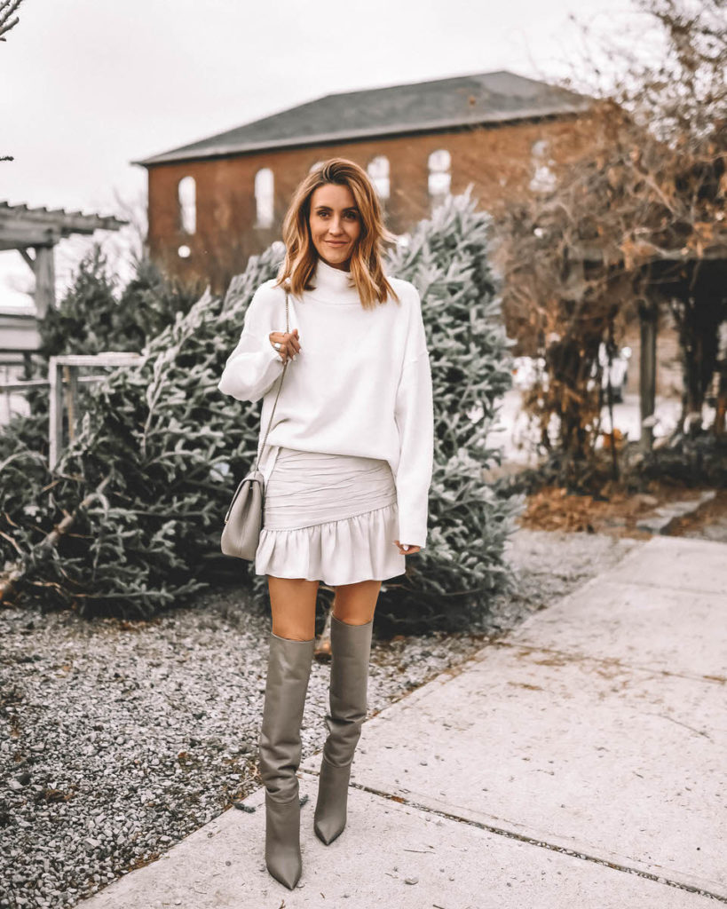 white sweater white mini skirt tall slouchy grey boots Holiday Style
