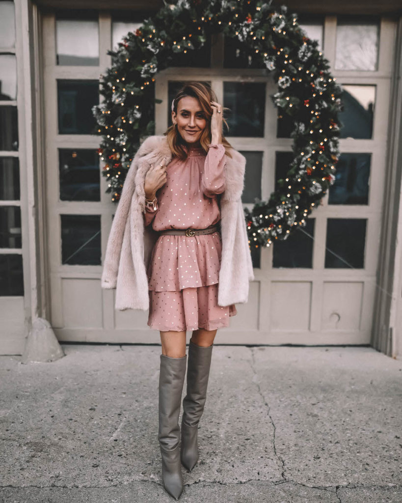 Style Blogger Karina Reske wearing polka dot ruffle blush mini dress faux fur nude coat tall slouchy grey boots  