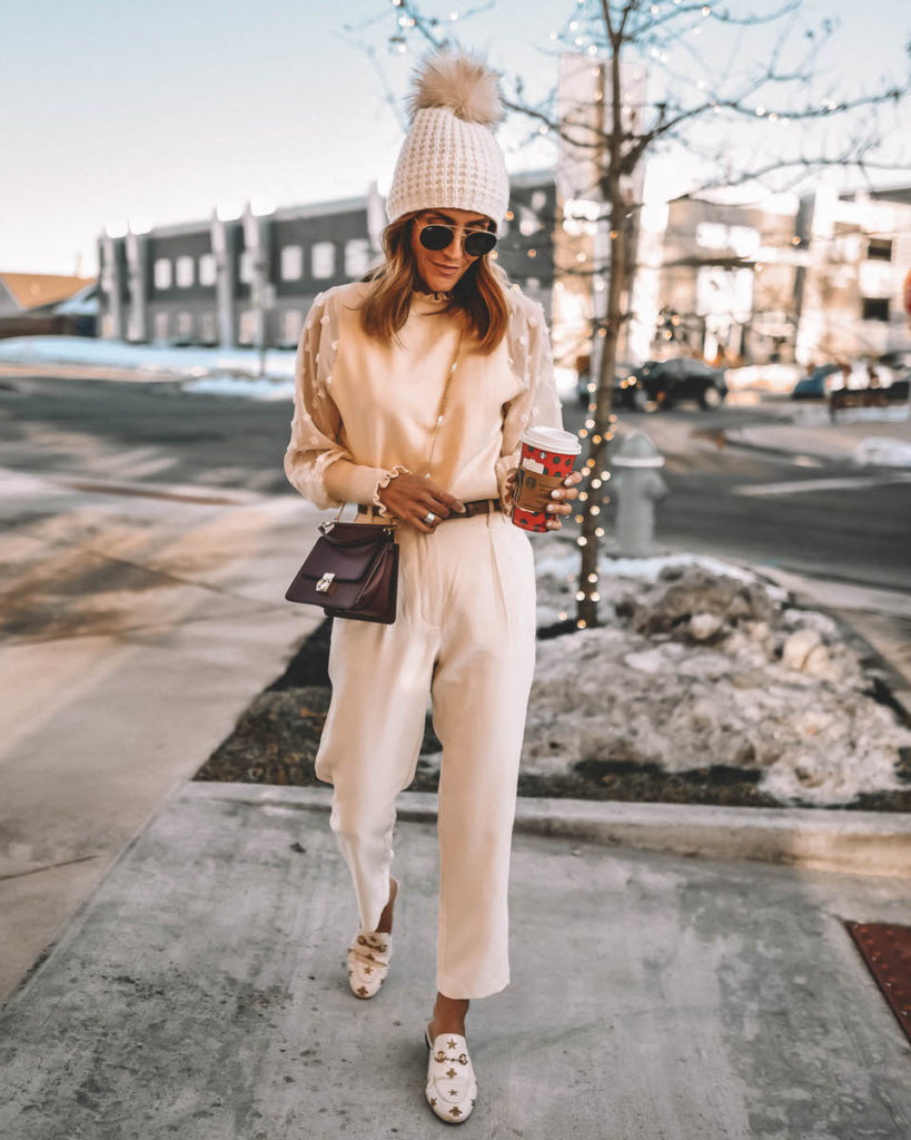 Fashion blogger Karina Reske wearing monochromatic cream outfit  winter style