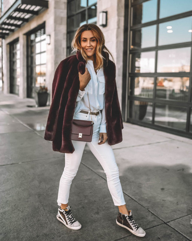 Karina Style Diaries wearing all white look with burgundy accents