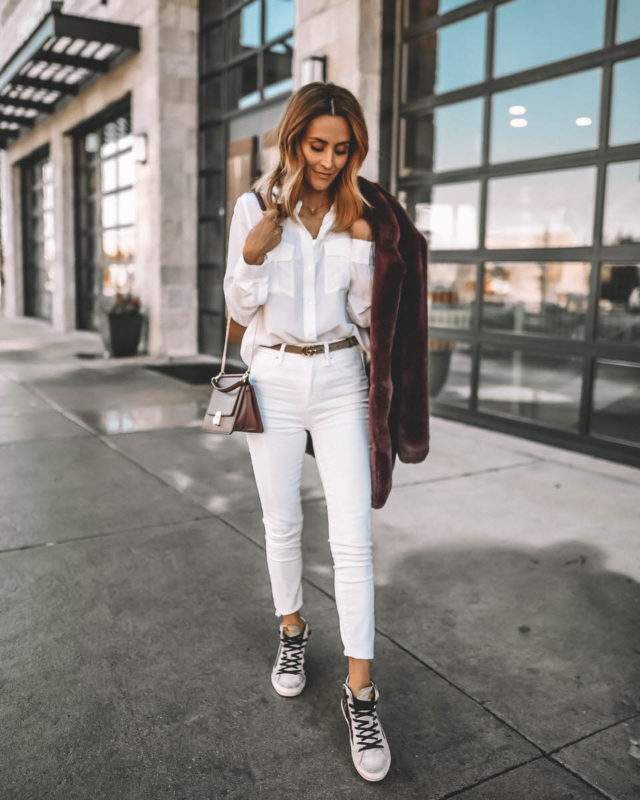 Karina Style Diaries wearing all white look with burgundy accents