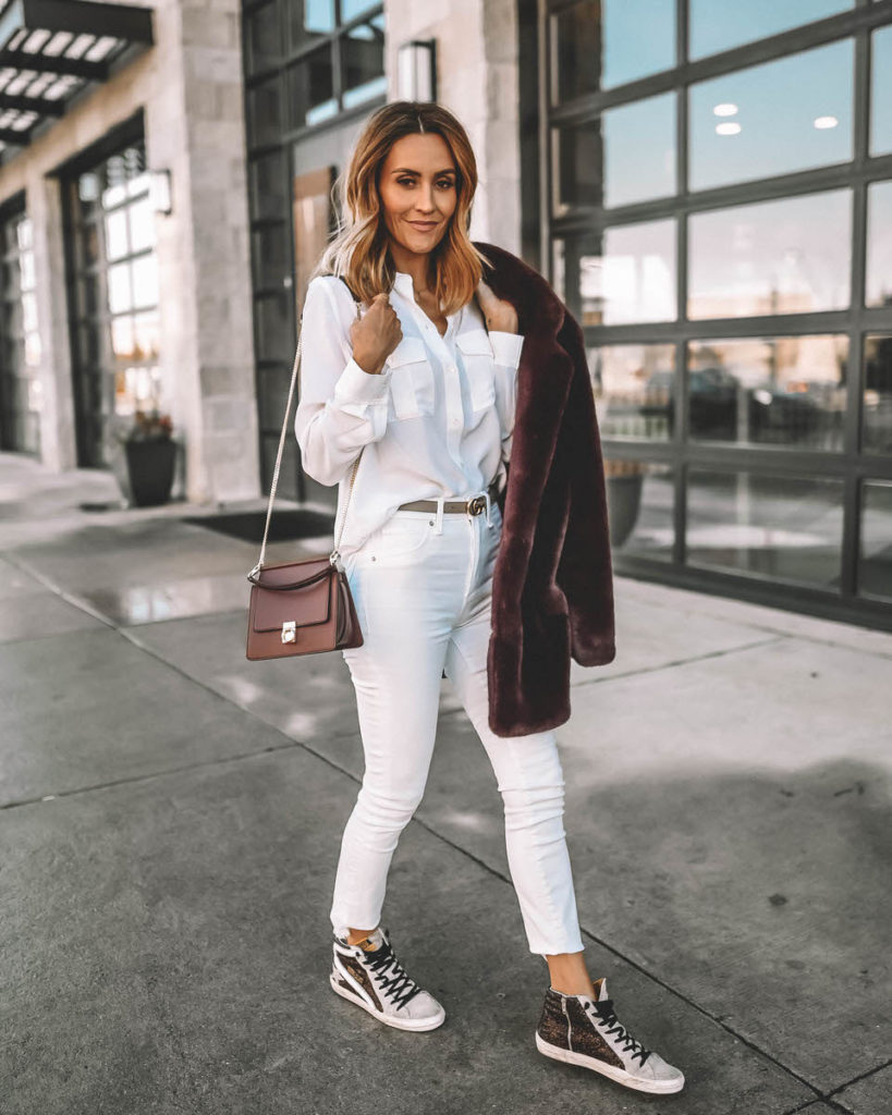 Karina Style Diaries wearing all white look with burgundy accents