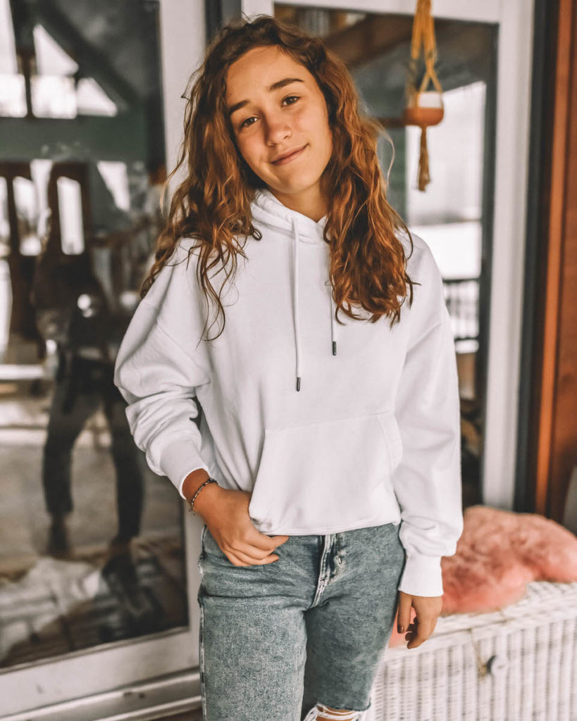 white cropped hoodie mom jeans fleece & love