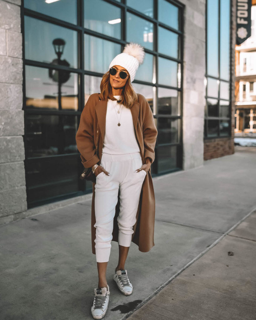 Karina Style Diaries wearing all white and camel outfit winter style