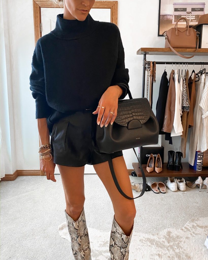 oversized sweater leather shorts snakeskin boots all black outfit
