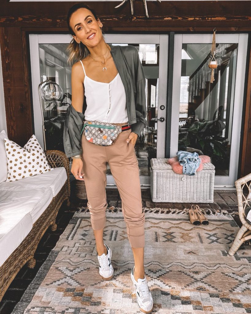 Karina Style Diaries wearing cozy joggers white cami bomber jacket tretorn sneakers gucci belt bag