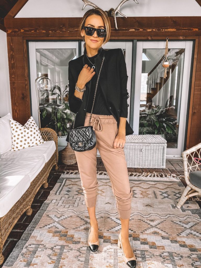 Karina Style Diaries wearing cozy joggers black tee fitted blazer chanel dupe cap toe slingbacks chanel bubble bag Celine sunglasses casual chic outfit 