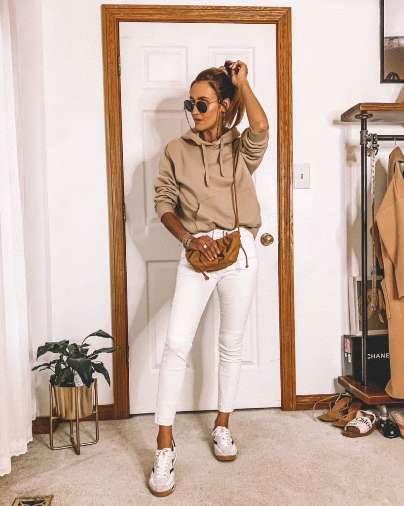 Karina style diaries styling a hoodie white cropped jeans tretorn sneakers crossbody bag