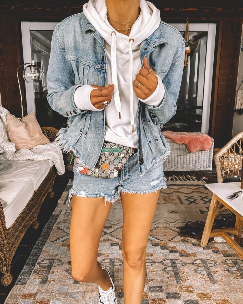 Denim on denim outfit jeans shorts jeans jacket white cropped hoodie gucci belt bag