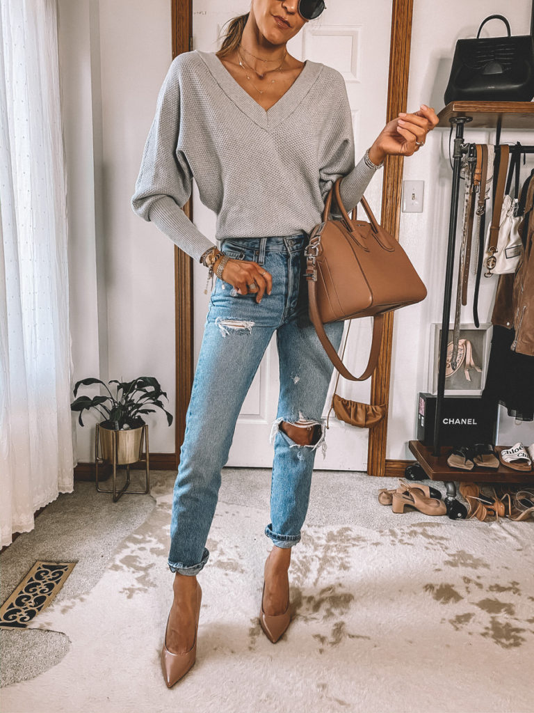 Karina Style Diaries wearing levi's 501 v-neck sweater pumps Jeans outfit