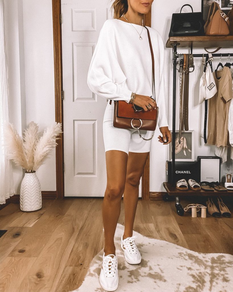 Karina Style Diaries wearing white biker shorts dolman sleeve sweater camel hat all white summer outfit