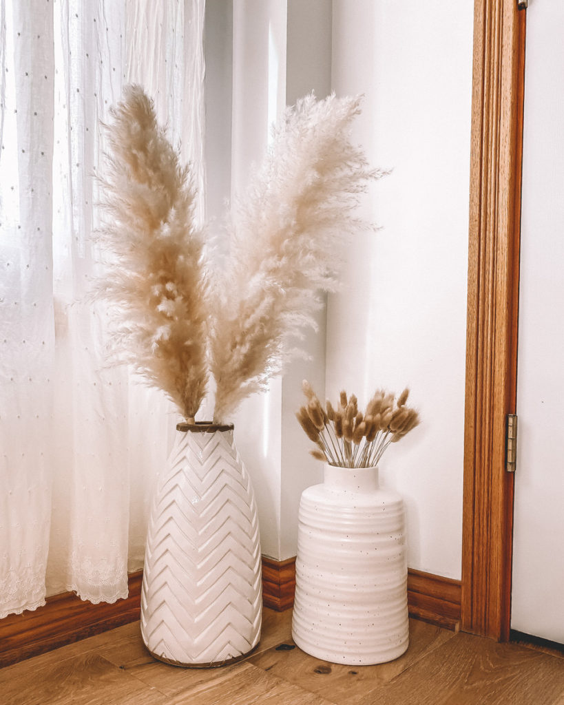 Crate and Barrel white vases pampas grass