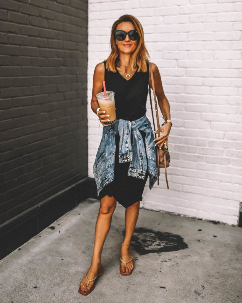 Karina Style Diaries wearing black midi cotton dress with kee knot jean jacket tied arunf the waist crossbody Mansur Gavriel Protea bag outfit   