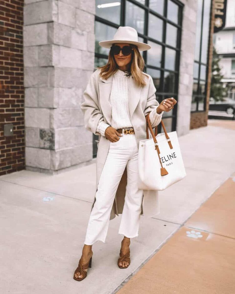 Karina Style Diaries wearing monochromatic cream outfit fall layers in cream Tamara Mellon sandals Celine Canvas logo bag long wool coat fall style