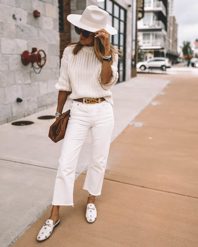 Karina Style Diaries wearing monochromatic cream outfit fall layers in cream Tamara Mellon sandals Celine Canvas logo bag long wool coat fall style