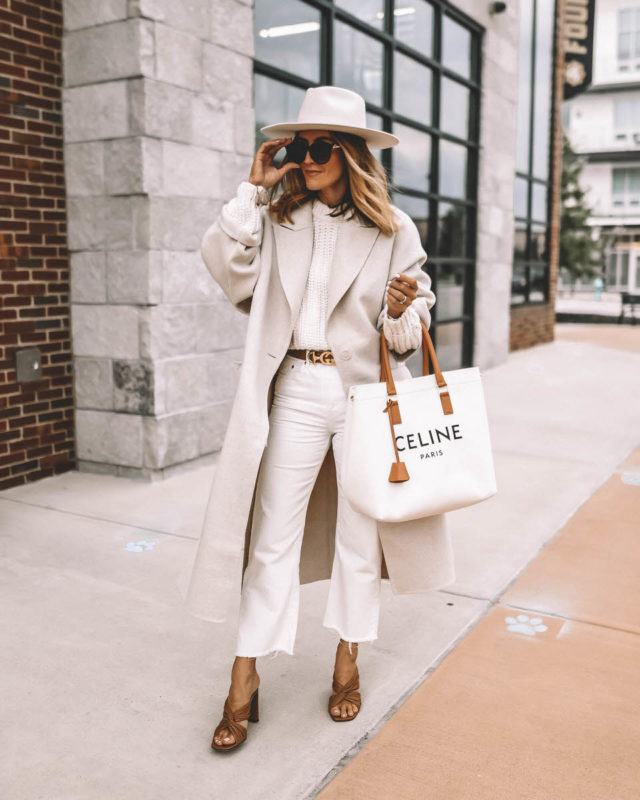 Karina Style Diaries wearing monochromatic cream outfit fall layers in cream Tamara Mellon sandals Celine Canvas logo bag long wool coat fall style