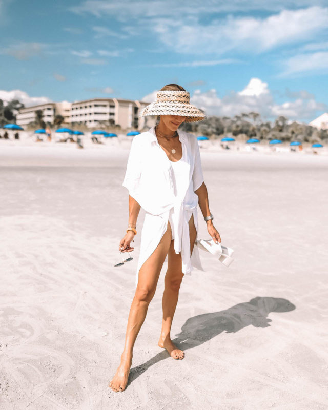 Karina Style Diaries Hilton Head beach wearing L'space Gold striped bathing suit cover up and visor hat