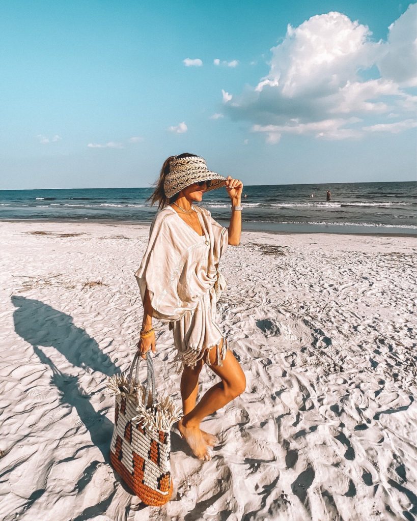 Karina Style Diaries Hilton Head beach wearing L'space Gold striped bathing suit cover up and visor hat  