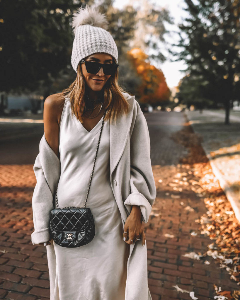 Satin slip dress outfit oversized cardigan white beanie chanel bag neutral style