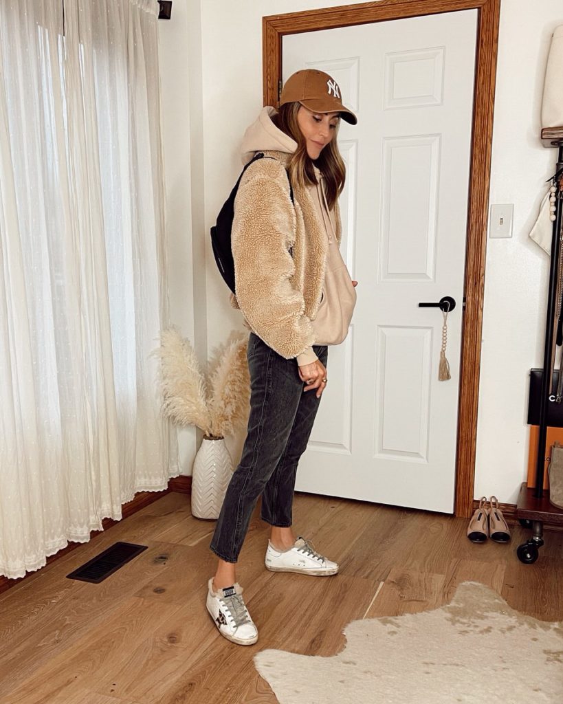 Karina Style Diaries wearing aloyoga sherpa high rise jeans golden goose sneakers champion hoodies fall style