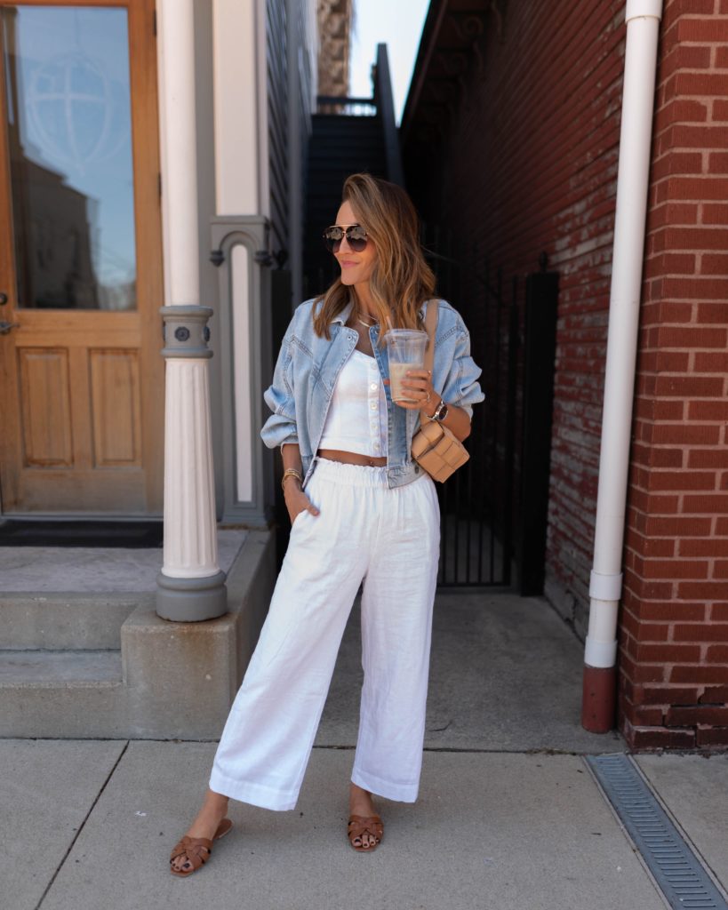 Karina Style Diaries wearing abercrombie and fitch blouse and linen pants denim jacket leather bag tan leather shoes spring neutral style