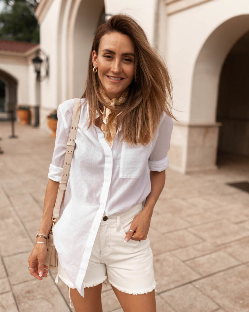 Karina Style Diaries wearing cream shorts, neck scarfsee through cotton shirt, summer outfit