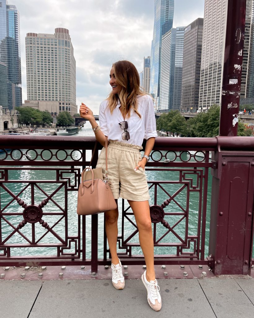 Karina Style Diaries wearing button up linen shorts tory burch sneakers givenchy bag neutral style