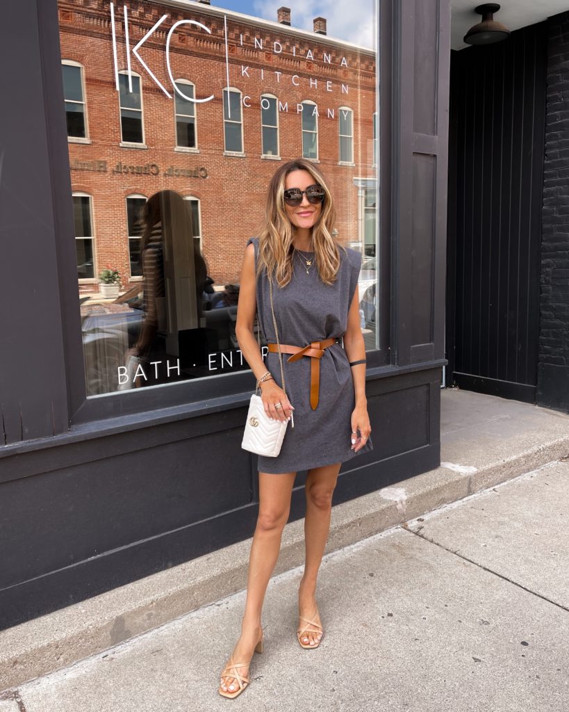 Karina Style Diaries wearing muscle t dress, leather belt, strappy sandal, gucci bag