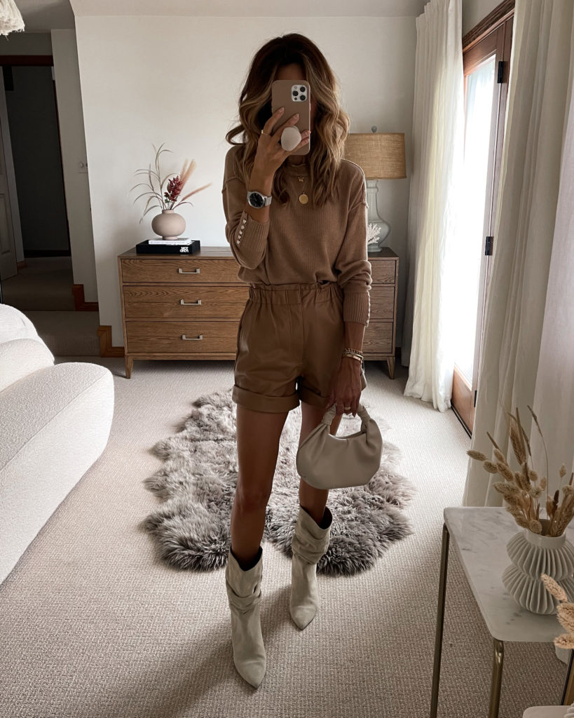 Karina Style Diaries wearing heartlook sweater, shorts, slouchy boots